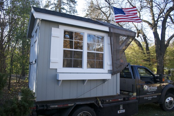LE Shed on truck with flag