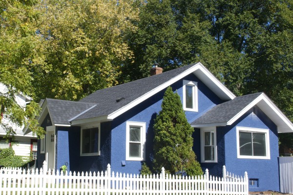 Blue with white picket fence