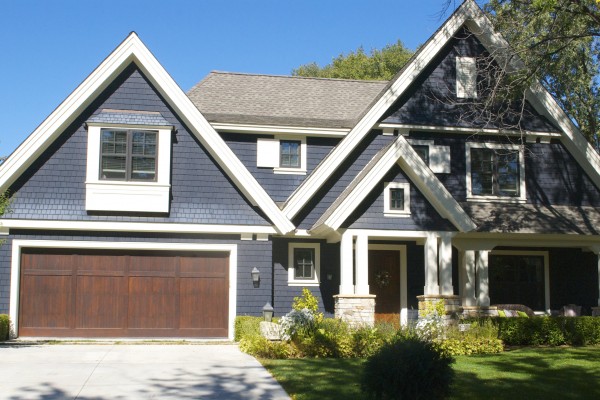 Blue with wood garage door